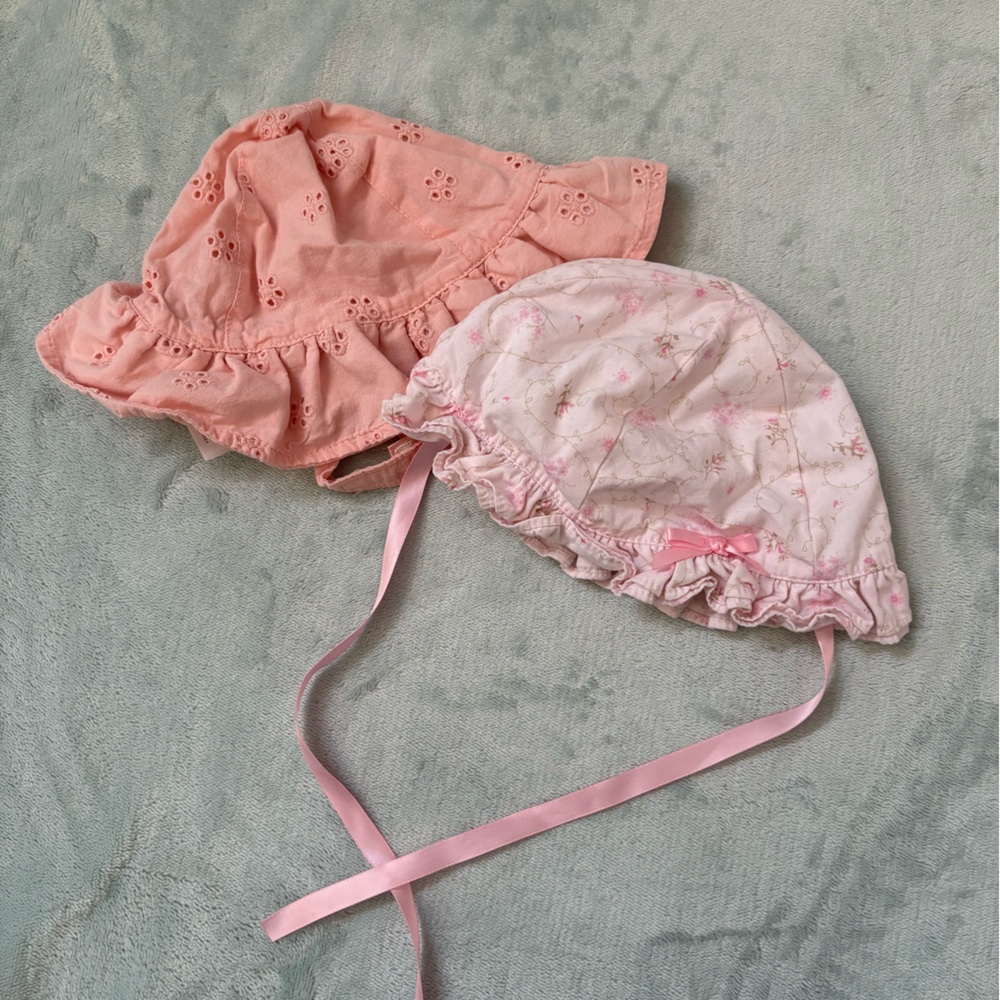 Two Pink Hats with Delicate Detailing